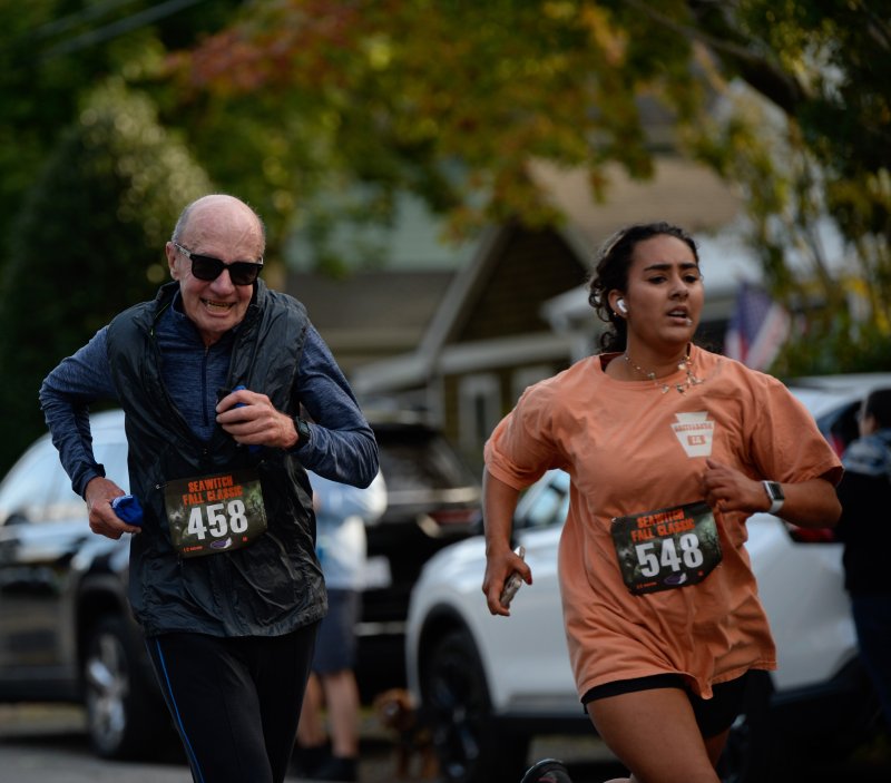 Grace Lucas, 16, stays a step ahead of Louis Dwyer, 81.